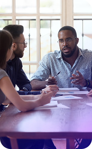solution-leadership Man talking to co-workers