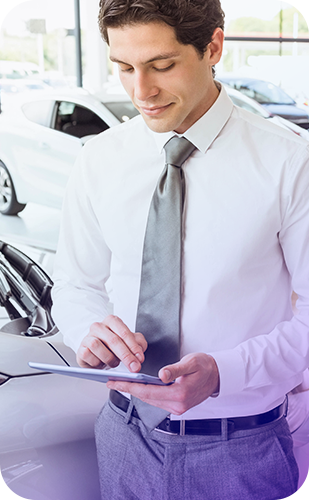 solution-sales Man reviewing a tablet